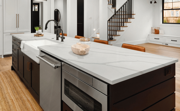 New construction kitchen with a Calacatta quartz island installed by Blue Sky Countertops