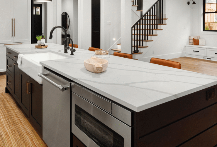 New construction kitchen with a Calacatta quartz island installed by Blue Sky Countertops