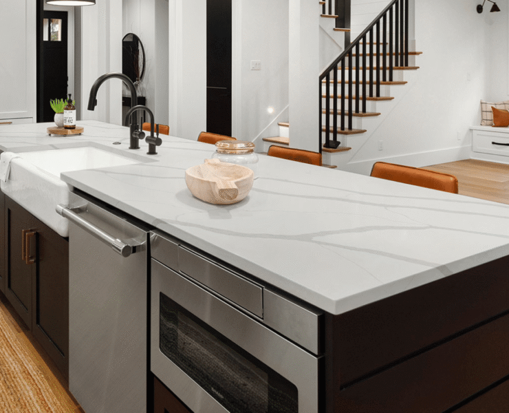 New construction kitchen with a Calacatta quartz island installed by Blue Sky Countertops